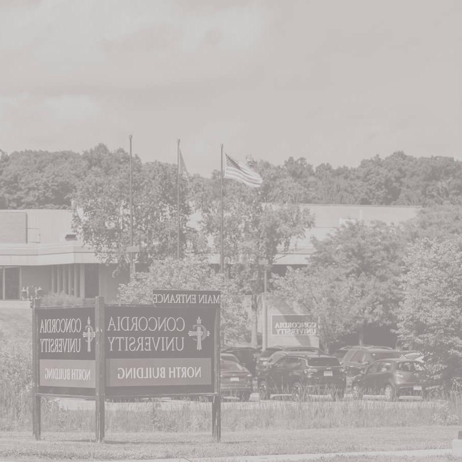 A wide shot of the Ann Arbor campus and the main entrance signage.